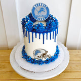 Cake with Detroit Lions branding on a white background
