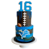 Cake with number 16, football design, and blue and brown colors on a white background