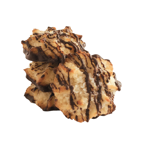 Coconut macaroons with chocolate drizzle on a white background