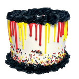 Red & Yellow Superhero Drip Cake