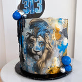 Cake with lion design and blue number 313 on top