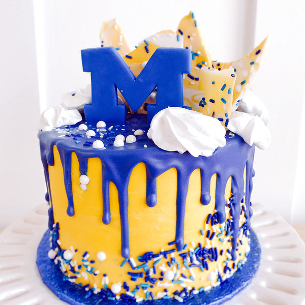 U of M Overloaded Drip Cake | The Home Bakery