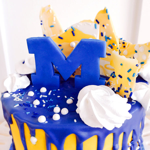 U of M Overloaded Drip Cake | The Home Bakery